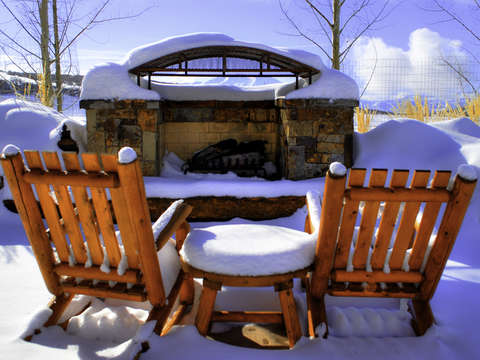 Fireplace snow and chairs