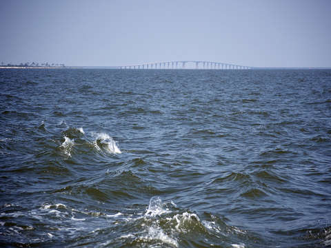 Ocean waves by the dauphin island bridge