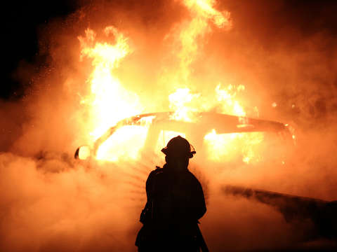 Firefighter extinguishes truck
