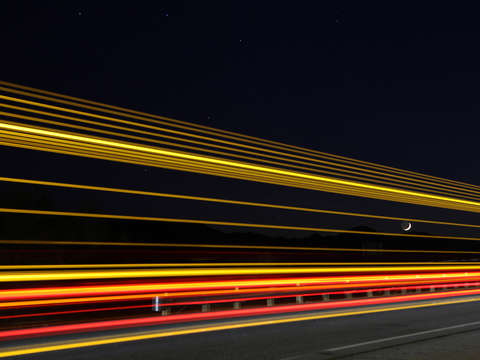 Moon between the light streaks