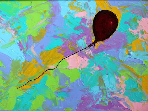 Red baloon in a pastel storm