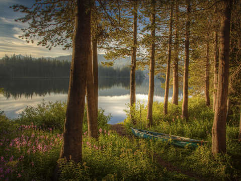 Sunrise on serene lake