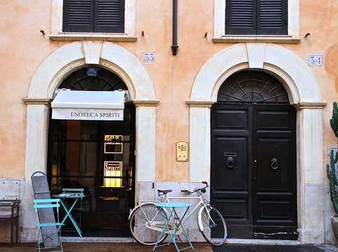 Bicycle with Blue Table and Chairs in Roma