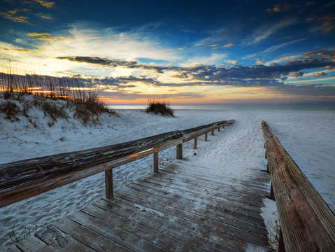 Sand covered beach walk