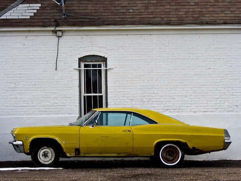 Old yellow impala