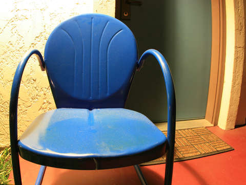 Old blue metal chair