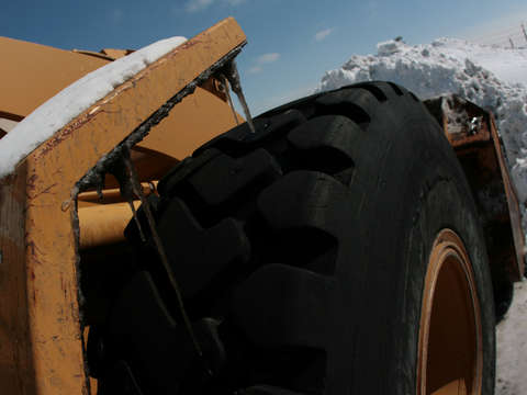 Front end loader in snow