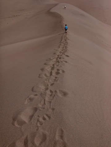Walking on sand dunes