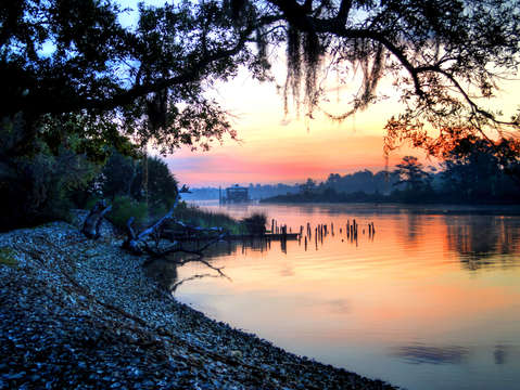Pink over boathouse
