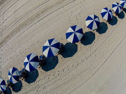Blue and white umbrellas