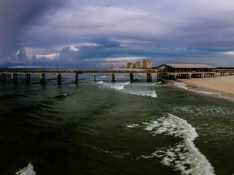 Gulf state pier storm clouds