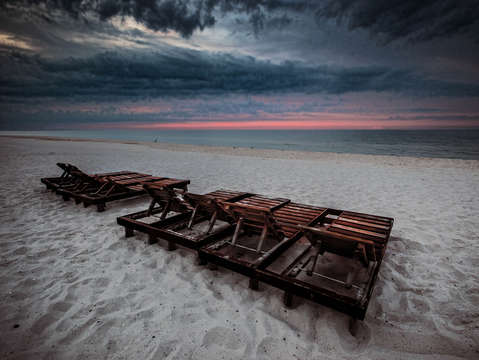 8 Chairs Waiting for the Sun