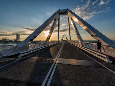 Port bridge sunburst barcelona