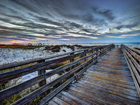 Sunrise boardwalk at cotton bayou beach