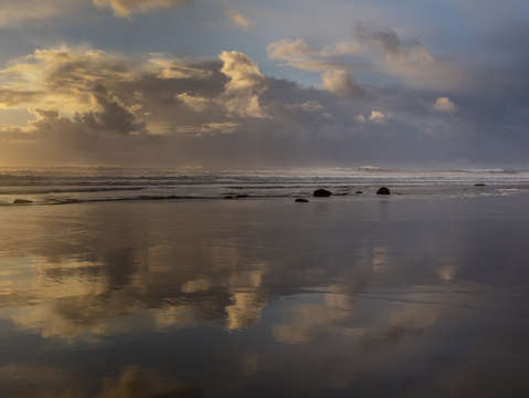Sunset on a Mirrored Beach