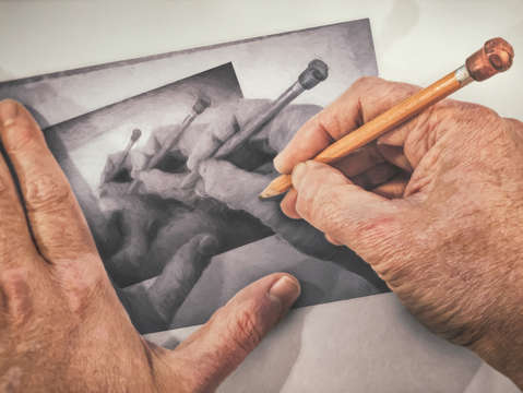 Hands drawing hands