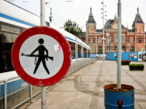 Central station armed guard sign