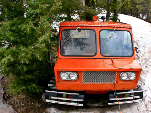Orange snow grooming machine sipapu nm