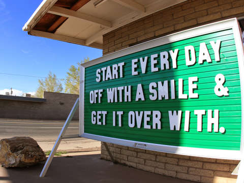 Smile and get it over with