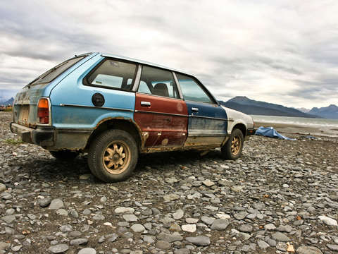 Car on the beach in homer alaska