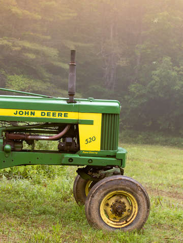 Old john deere 520 foggy morning