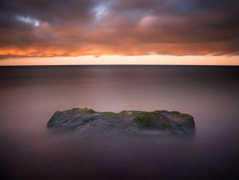 Lone stone at sunrise