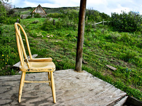 Yellow chair near aspen