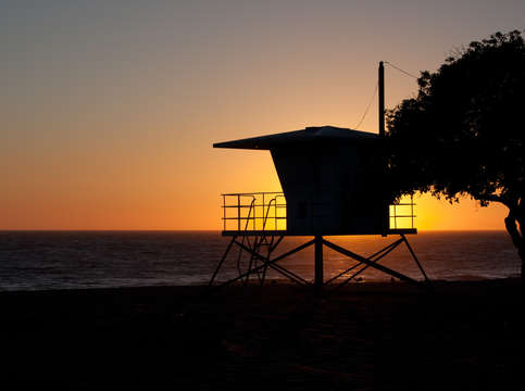 California life guard shack at sunset