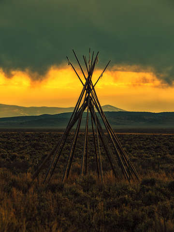 Teepee storm sunset