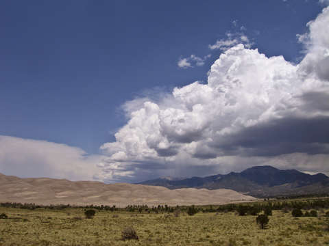 Clouds rolling over great sand dunes national park