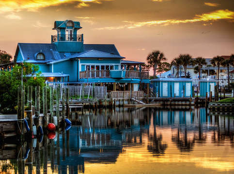 Happy harbor blue house on canal
