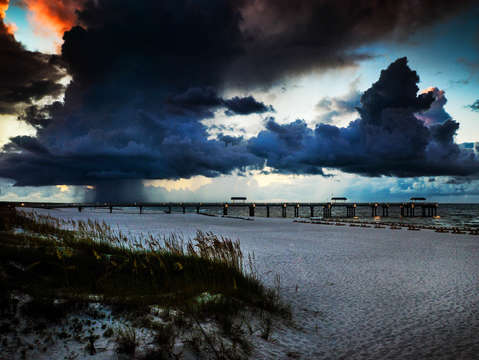 Storm clouds over perdido pass and 4 seasons pier