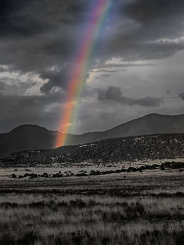 Mountain landscape bw with rainbow