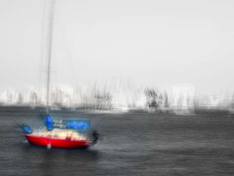 Red boat blue sails