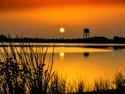 Sunrise reflection on lake shelby
