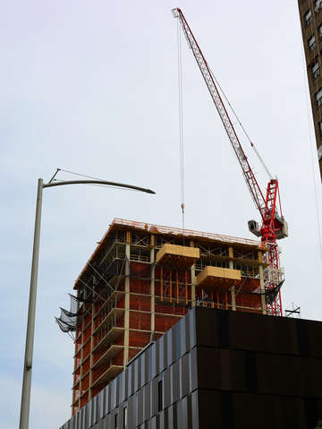 Men working in the sky in the lower east side