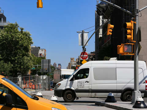 Taxi and a white van lower east side nyc 2017