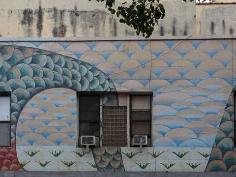 Scales along a mural in the lower east side