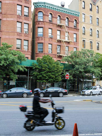 Riding a motorcycle in harlem nyc