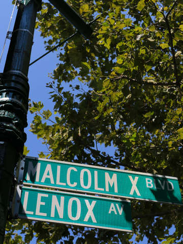 Street sign malcolm x blvd harlem nyc new york