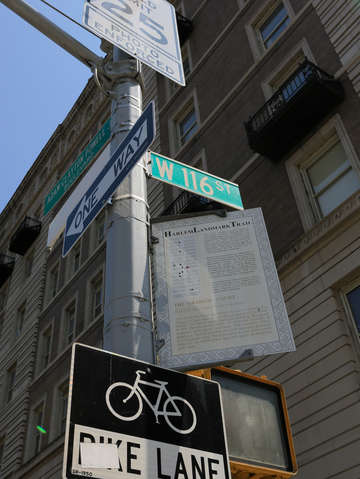 Street sign w116th st harlem nyc new york