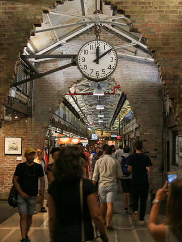 Clock inside chelsea market nyc