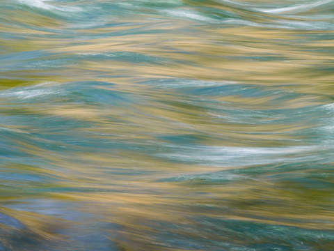Blue river reflections