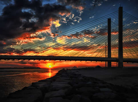 Sunset bridge at indian river inlet