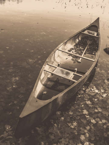Old canoe on the lake