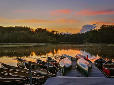 Charles river canoe and sunset
