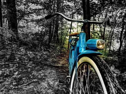 The old blue bike on the trail