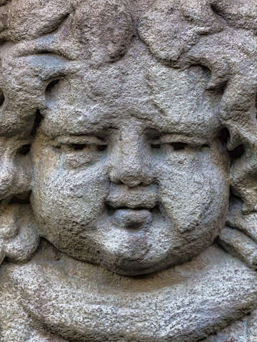 Carved stone face