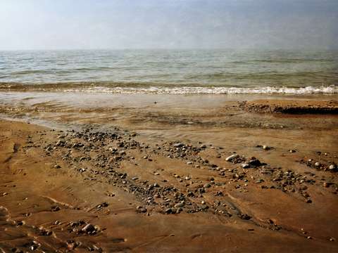 Shoreline with creek and stones