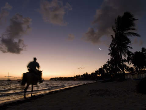 Riding on the beach